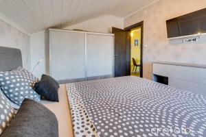 Postel nebo postele na pokoji v ubytování Apartments & Rooms Laganini
