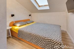 Postel nebo postele na pokoji v ubytování Apartments & Rooms Laganini