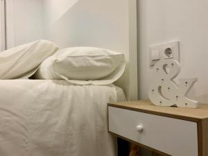 Postel nebo postele na pokoji v ubytování MonResidence Cavall Bernat