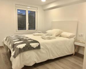 Postel nebo postele na pokoji v ubytování MonResidence Cavall Bernat