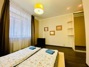 Cama ou camas em um quarto em uTrip Prague