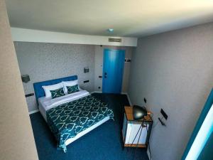 Letto o letti in una camera di Pano Hotel