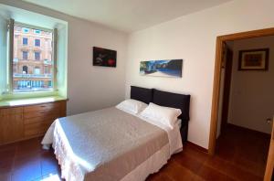 Katil atau katil-katil dalam bilik di Apartment Arenula