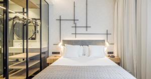 Postel nebo postele na pokoji v ubytování Hotel Ilunion San Mamés