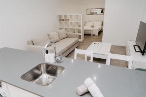 Televízia a/alebo spoločenská miestnosť v ubytovaní Nuevo y cómodo loft junto a la Mezquita