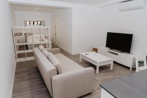 Televízia a/alebo spoločenská miestnosť v ubytovaní Nuevo y cómodo loft junto a la Mezquita