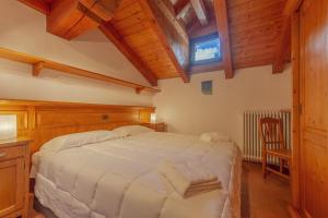 Ένα ή περισσότερα κρεβάτια σε δωμάτιο στο Chalet Pontal 5