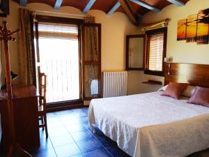 Postel nebo postele na pokoji v ubytování Hotel El Zorro + 31 fotografií