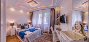 Posteľ alebo postele v izbe v ubytovaní B&P Maine Street Apartments