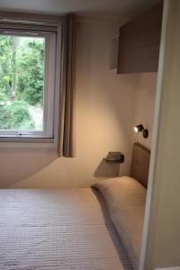 Postel nebo postele na pokoji v ubytování Camping Gabicce Monte