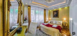 Posteľ alebo postele v izbe v ubytovaní B&P Maine Street Apartments