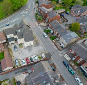 an aerial view of a town with houses and a street at 2B SPV Double En-suite Room in Wakefield