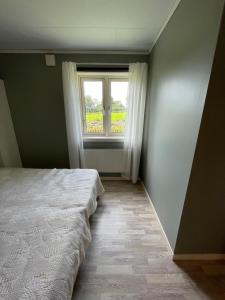 Voodi või voodid majutusasutuse Humpen, Hultåkra toas