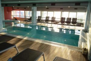 Bazén v ubytování Bibione Palace Hotel nebo v jeho okolí