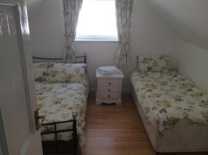 Postel nebo postele na pokoji v ubytování Charming 3-Bed Cottage Exmoor near Barnstaple