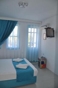 Cama o camas de una habitación en Hotel Nisa