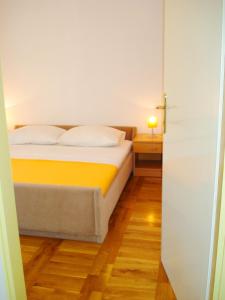 Cama o camas de una habitación en Apartments Nikolas