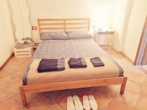 Posteľ alebo postele v izbe v ubytovaní Casetta nel Podere di Massi