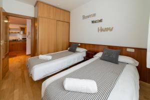 Posteľ alebo postele v izbe v ubytovaní Bed and Snow Apartments