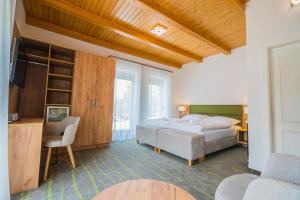 Postel nebo postele na pokoji v ubytování Hotel Diana
