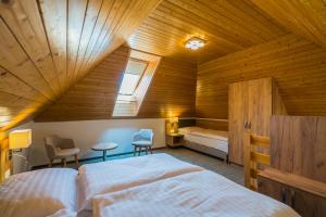 Postel nebo postele na pokoji v ubytování Hotel Diana