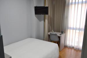 Koupelna v ubytování Hotel Alda Centro Oviedo + 37 fotografií