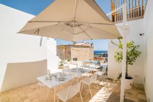 Een balkon of terras bij Tre Archi Suite & Relais