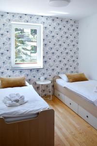 Ein Bett oder Betten in einem Zimmer der Unterkunft Villa Planina