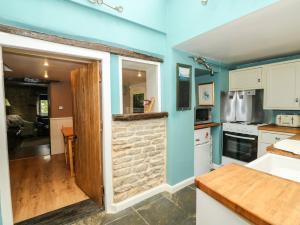 A cozinha ou cozinha compacta de Apple Tree Cottage