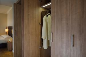 Кровать или кровати в номере Hotel Rossini