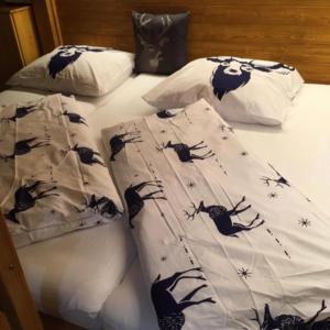 Postel nebo postele na pokoji v ubytování Apartmán Čučoriedka