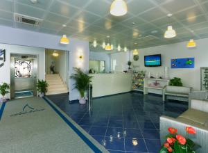 a lobby of a hospital with a waiting room at Aurea Hotel in Tortoreto Lido