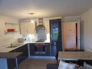 Kjøkken eller kjøkkenkrok på Vetrelax Basildon Blake Apartment