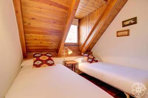 Llit o llits en una habitació de LA SOLANA de Alma de Nieve