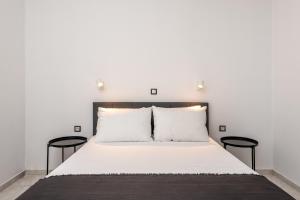 Postel nebo postele na pokoji v ubytování Costa Azzurra Hotel