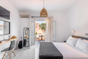 Postel nebo postele na pokoji v ubytování Costa Azzurra Hotel + 37 fotografií