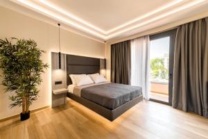 מיטה או מיטות בחדר ב-Megusta Suites