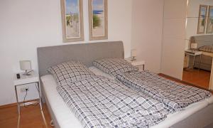 Krevet ili kreveti u jedinici u objektu HansaResidenz Scharbeutz