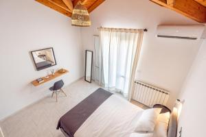 Postel nebo postele na pokoji v ubytování Costa Azzurra Hotel