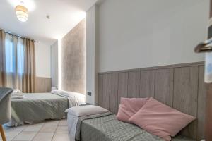 Ένα ή περισσότερα κρεβάτια σε δωμάτιο στο Villa Rocla guest house Pompei +163 φωτογραφίες