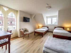 Posteľ alebo postele v izbe v ubytovaní Apartment Jinghu