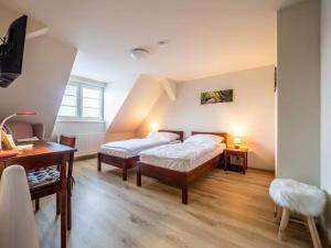 Posteľ alebo postele v izbe v ubytovaní Apartment Jinghu
