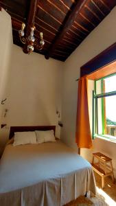 Postel nebo postele na pokoji v ubytování La Casa sul Blu Albergo Diffuso