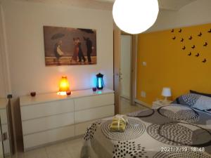 A bed or beds in a room at Casa Gardel