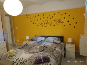 A bed or beds in a room at Casa Gardel