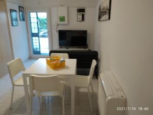 A television and/or entertainment centre at Casa Gardel