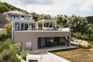 a house on the hill with a view at Villa Aetos in Paleros