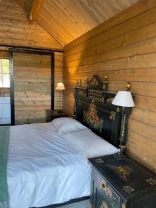 A bed or beds in a room at Casa Paloma