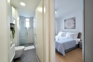Posteľ alebo postele v izbe v ubytovaní On Time Apartment