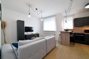 Kuchyňa alebo kuchynka v ubytovaní On Time Apartment